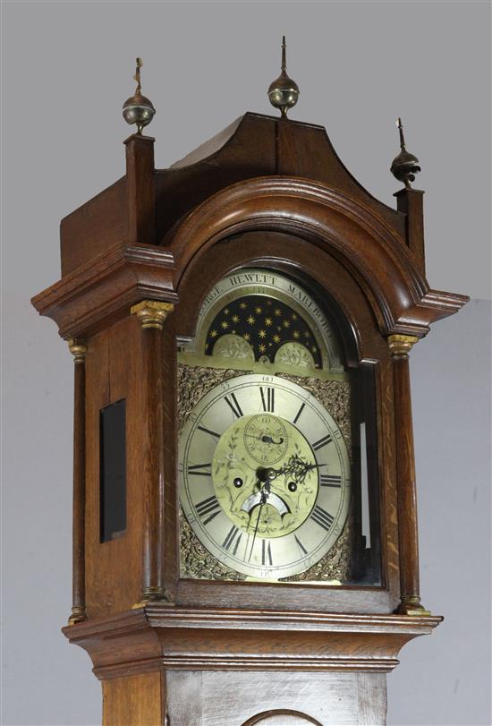George Hewett of Marlborough. A George III oak eight day longcase clock, H.7ft 9in.